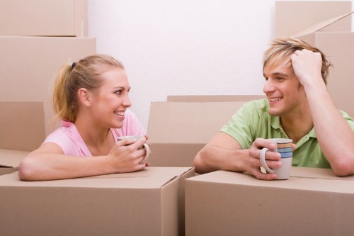 Local movers handling boxes and household items in Finchley