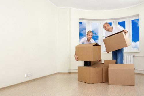 Moving boxes and household items loaded for transport in Finchley