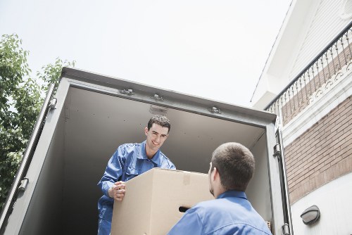 Trained removal staff handling furniture safely in Finchley