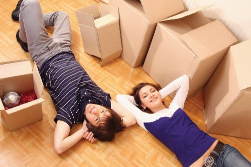 Professional packers organising household items for transport in Finchley