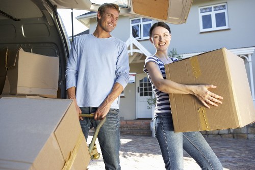 Local moving team loading furniture near a Finchley home